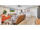 Cozy living room with wood flooring and bar seating at 300 Peachtree Ne St # 6H, Atlanta, GA 30308