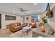 Inviting living room features a comfortable leather sofa and view of the city at 300 Peachtree Ne St # 6H, Atlanta, GA 30308