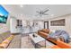 The living room features a stylish sofa, wet bar, and neutral decor at 300 Peachtree Ne St # 6H, Atlanta, GA 30308
