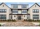 Charming brick townhome with well-maintained landscaping and inviting entrance at 3933 Danube Ln # 221, Atlanta, GA 30339