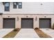 A row of well-maintained garages showcasing exterior design and multiple parking spaces for residents at 3933 Danube Ln # 221, Atlanta, GA 30339