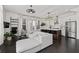 Bright living space with large windows, modern furniture, and stainless kitchen appliances at 3933 Danube Ln # 221, Atlanta, GA 30339
