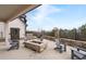 An outdoor patio with a fire pit, surrounded by comfortable seating, creating a cozy and inviting gathering space at 3933 Danube Ln # 221, Atlanta, GA 30339