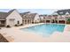 A pristine swimming pool with lounge area, perfect for relaxation and recreation in a community setting at 3933 Danube Ln # 221, Atlanta, GA 30339