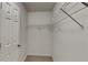 Walk-in closet with wire shelving for optimal storage and organization at 4928 Bryant Dr, Snellville, GA 30039