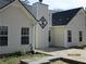 Backyard featuring a fire pit area with stone patio at 561 Old Loganville Rd, Loganville, GA 30052