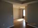 Bright living room with hardwood floors and lots of natural light at 561 Old Loganville Rd, Loganville, GA 30052