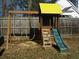Wooden playground set with swings, slide, and playhouse, perfect for Gathering fun in the backyard at 561 Old Loganville Rd, Loganville, GA 30052