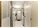 Functional hallway with storage options and access to laundry area, maximizing space efficiency at 1515 Ozora Rd, Loganville, GA 30052