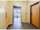 Hallway with concrete floors, light yellow walls and doorways to apartments at 244 Peters St # 23, Atlanta, GA 30313
