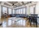 Spacious living room featuring hardwood floors, large windows, and comfortable seating at 244 Peters St # 23, Atlanta, GA 30313