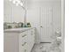 Bathroom featuring marble floors, a quartz countertop, and gold hardware, offering a luxurious feel at 2976 Wilsons Crossing Ct, Decatur, GA 30033