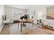 Home office space with hardwood flooring, a neutral rug, bright window, and a comfortable work area at 2976 Wilsons Crossing Ct, Decatur, GA 30033
