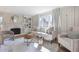 Cozy living room with fireplace, built-in shelving, and a cute dog at 2976 Wilsons Crossing Ct, Decatur, GA 30033