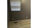 Neutral bedroom features wood-look floors, a window for natural light, and a floor vent at 650 Robert E Lee Pkwy, Jonesboro, GA 30238