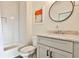 Modern bathroom with bathtub, sleek vanity, and artistic wall decor at 1100 Arkwright Se Pl # B, Atlanta, GA 30316