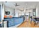 Open-concept living space with hardwood floors, a couch, and a view of the kitchen at 1100 Arkwright Se Pl # B, Atlanta, GA 30316