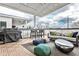 Inviting covered patio featuring comfortable seating, a grill, and an outdoor dining area, perfect for relaxation at 1100 Arkwright Se Pl # B, Atlanta, GA 30316
