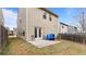 View of the backyard patio and the exterior of the home at 5015 Rapahoe Trl, Atlanta, GA 30349