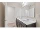 Modern bathroom with double sink vanity and stylish fixtures offers convenience at 5015 Rapahoe Trl, Atlanta, GA 30349