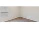 Cozy, carpeted bedroom with a bright window offers a simple, clean space at 5015 Rapahoe Trl, Atlanta, GA 30349