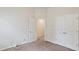 Carpeted bedroom with closet and neutral paint provides versatile living space at 5015 Rapahoe Trl, Atlanta, GA 30349