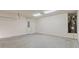 Spacious two-car garage with ample space for storage and utility access at 5015 Rapahoe Trl, Atlanta, GA 30349