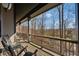 This home boasts a charming back porch and outdoor seating with wooded views at 101 Bevil Ridge Se Rd, Emerson, GA 30137
