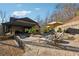 Spacious backyard featuring a pool, fire pit, and outdoor seating, all set within a beautifully landscaped area at 101 Bevil Ridge Se Rd, Emerson, GA 30137