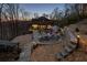 A picturesque backyard oasis complete with a pool, fire pit, and ample seating for outdoor enjoyment at 101 Bevil Ridge Se Rd, Emerson, GA 30137