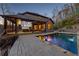 Backyard featuring a refreshing pool and outdoor theater on the covered patio at 101 Bevil Ridge Se Rd, Emerson, GA 30137