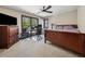Comfortable bedroom with a large window, ceiling fan, neutral walls and an adjacent work space at 101 Bevil Ridge Se Rd, Emerson, GA 30137