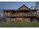 Stunning two-story home with a covered porch, stone accents, and professional landscaping at 101 Bevil Ridge Se Rd, Emerson, GA 30137