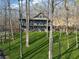 Charming home with manicured lawn, surrounded by mature trees creating a peaceful retreat at 101 Bevil Ridge Se Rd, Emerson, GA 30137