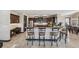 Modern kitchen with dark wood cabinetry, granite counters, stainless steel appliances, and breakfast bar at 101 Bevil Ridge Se Rd, Emerson, GA 30137