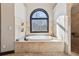 Beautiful main bathroom with tub, walk-in shower, and wooded views at 101 Bevil Ridge Se Rd, Emerson, GA 30137