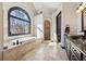 Large main bathroom features a soaking tub and walk-in shower at 101 Bevil Ridge Se Rd, Emerson, GA 30137
