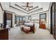 Spacious main bedroom features a trey ceiling, ceiling fan, sitting area, and views at 101 Bevil Ridge Se Rd, Emerson, GA 30137