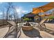 Outdoor patio featuring a fire pit, lounge chairs, and backyard view, creating a cozy and inviting space at 101 Bevil Ridge Se Rd, Emerson, GA 30137