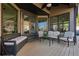 Covered porch with comfortable seating, a ceiling fan, and ample space for outdoor relaxation and entertainment at 101 Bevil Ridge Se Rd, Emerson, GA 30137