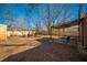 Spacious backyard with covered seating and a newly installed wooden fence, providing privacy and charm at 1475 Elizabeth Ln, East Point, GA 30344