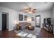 Inviting living room with modern decor, hardwood floors, and a comfortable sofa at 1475 Elizabeth Ln, East Point, GA 30344