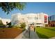Exterior shot of the High Museum of Art, showcasing the modern white facade, lawn, and pedestrian walkway at 198 Ponce De Leon Ne Ave # 2A, Atlanta, GA 30308