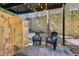 Charming outdoor patio with privacy screen, chairs, and a patterned rug at 198 Ponce De Leon Ne Ave # 2A, Atlanta, GA 30308