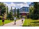 Lush green space with walking paths, modern apartments, an overpass mural, and pedestrians, in a neighborhood setting at 198 Ponce De Leon Ne Ave # 2A, Atlanta, GA 30308