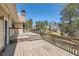 Wooden back deck overlooking yard and wooded area at 12142 Panhandle Rd, Hampton, GA 30228