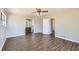 Large main bedroom with wood flooring and an en suite bathroom at 12142 Panhandle Rd, Hampton, GA 30228