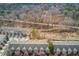 An aerial view of a residential neighborhood in a wooded area at 2275 W Village Se Ln, Smyrna, GA 30080