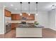 Modern kitchen featuring stainless steel appliances, dark countertops, and ample cabinet space at 2275 W Village Se Ln, Smyrna, GA 30080