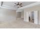 Large main bedroom featuring neutral paint, plush carpet, and ceiling fan at 2275 W Village Se Ln, Smyrna, GA 30080